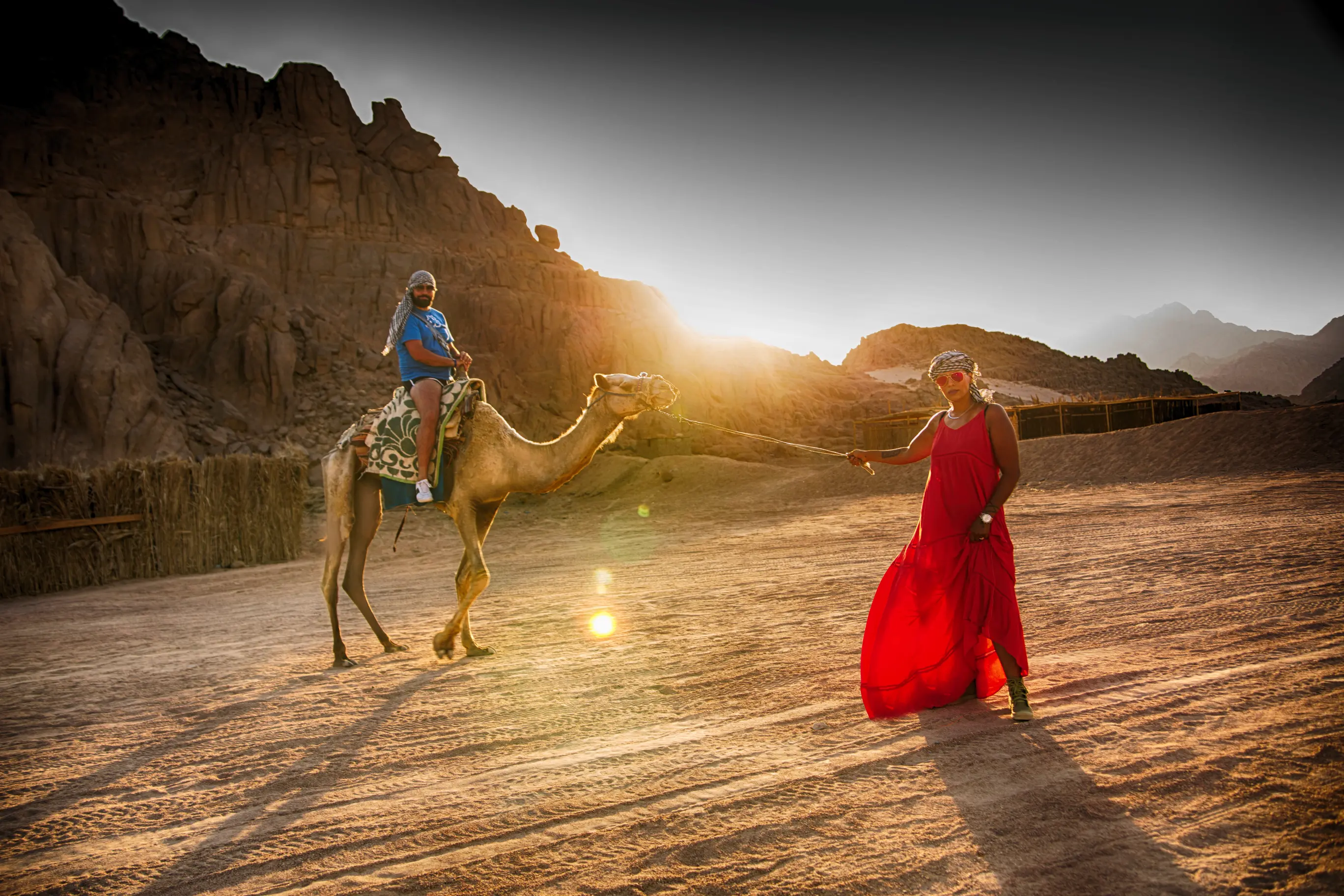 Camel Riding In Desert